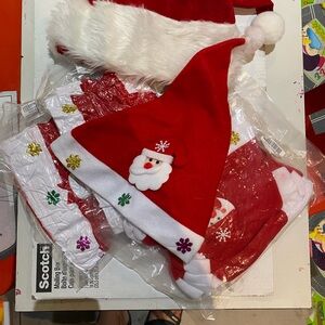 A lot of 20 Santa hats, some with characters one plain with faux fur.